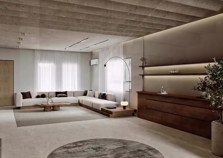 NES Interiors living-room design with soft seating, natural timber and warm integrated lighting